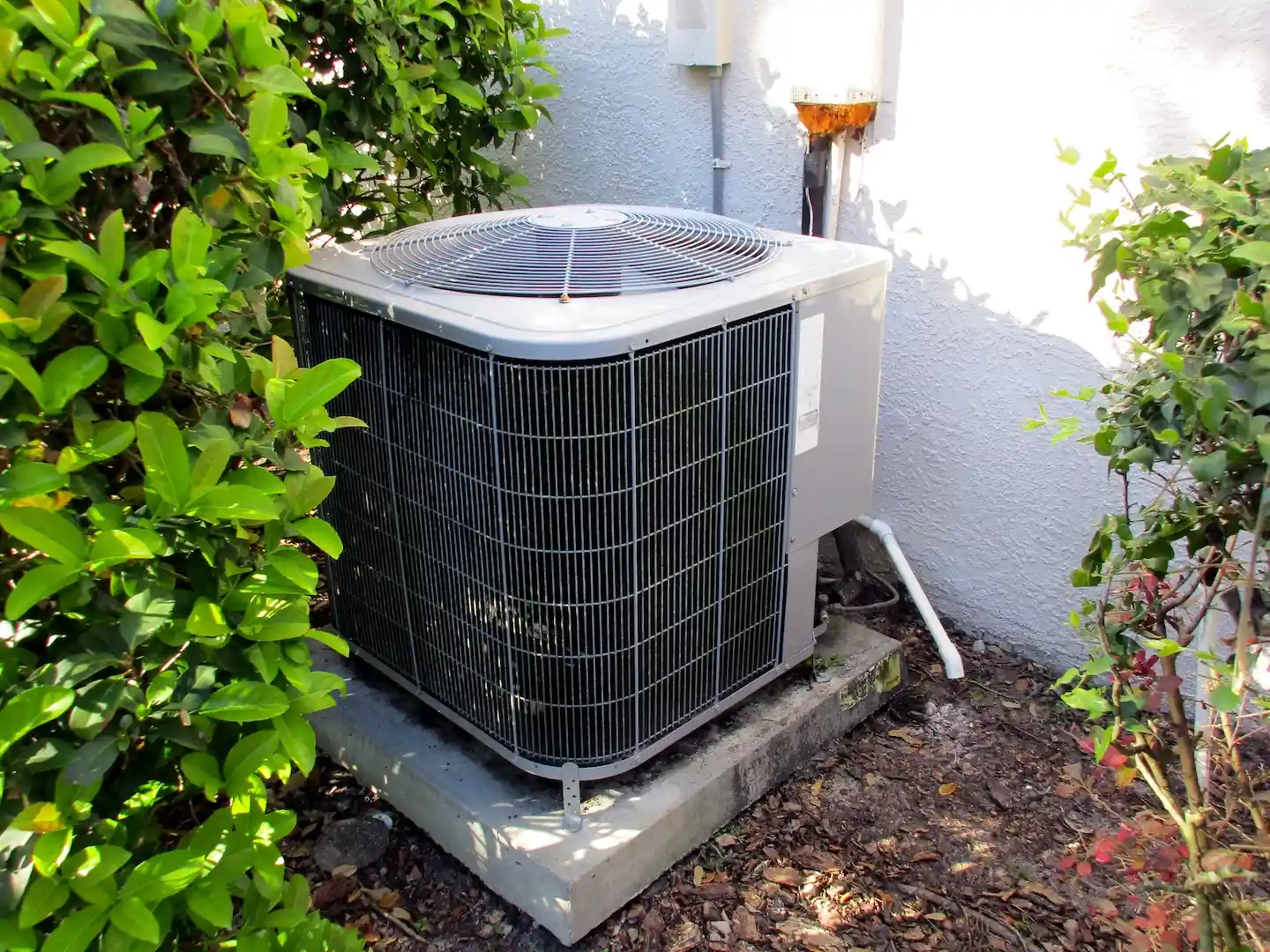 Outdoor air conditioning unit in Austin with AC compressor that needs to be reset.
