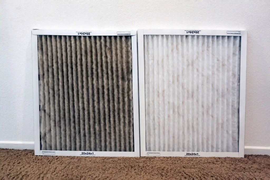 Dirty air conditioner filter on the left and clean new filter on the right.